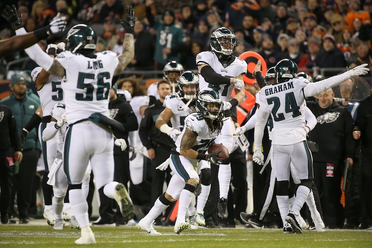 Eagles cornerback Avonte Maddox (29) and his teammates celebrate after they thought he made an interception, which was later ruled out of bounds and therefore only an incomplete pass after review, during a first-round playoff game against the Chicago Bears at Soldier Field in Chicago on Sunday, Jan. 6, 2019.