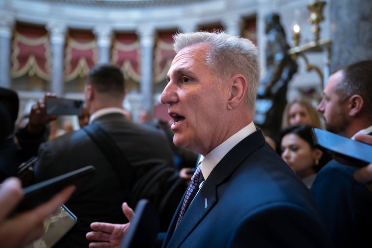 Speaker of the House Kevin McCarthy, R-Calif., stops for reporters' questions about passing a funding bill and avoiding a government shutdown, at the Capitol in Washington, Monday. McCarthy is trying to win support from right-wing Republicans by including spending cuts and conservative proposals for border security and immigration.