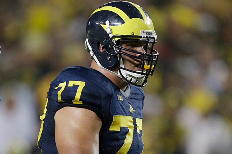 Michigan offensive linesman Taylor Lewan walks to the line of scrimmage. (Carlos Osorio/AP)