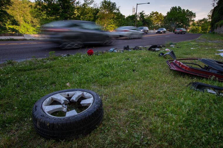 Debris from triple fatal car accident on Kelly Drive between Ferry and Hunting Park. Three people were killed late Wednesday evening and others were injured.