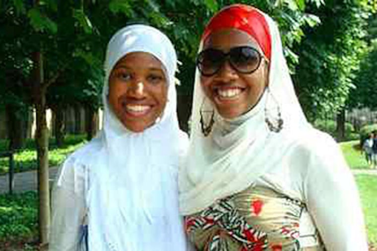 Sisters Naeemah (left), 27, and Ameerah Khabir, 23, of Philadelphia, are accompanying their father on the hajj, the annual pilgrimage to Mecca. (ALIYA KHABIR / For The Inquirer)
