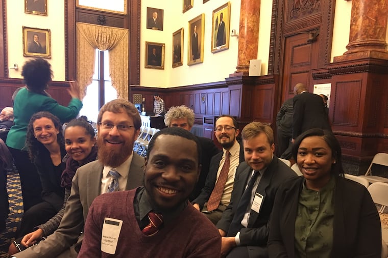 Community Legal Services staff at City Hall celebrate the Jan. 2018 announcement of the Philadelphia Eviction Prevention Project, a collaboration between the City and local nonprofits to help reduce evictions.