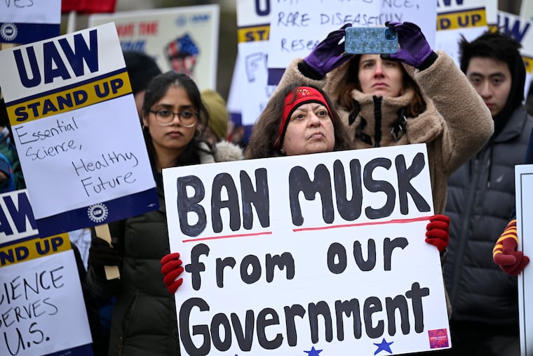 People rally at Health and Human Services headquarters to protest the polices of President Donald Trump and Elon Musk last wee in Washington.
