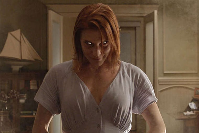 Mirror, mirror on the wall, why does Katee Sackhoff look so weird? It's because of the mirror, and its power of evil, or something.