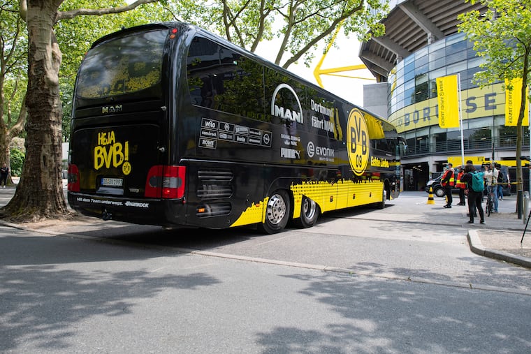 Borussia Dortmund's team bus arrives at Signal Iduna Park for Saturday's Bundesliga game against rival Schalke 04, the resumption of the season after a stoppage forced by the coronavirus pandemic.