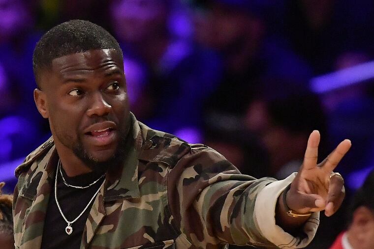 FILE - In this Jan. 29, 2019, file photo, actor Kevin Hart gestures during the second half of an NBA basketball game between the Los Angeles Lakers and the Philadelphia 76ers in Los Angeles. Hart has been injured in a car crash in the hills above Malibu on Sunday, Sept. 1. (AP Photo/Mark J. Terrill, File)
