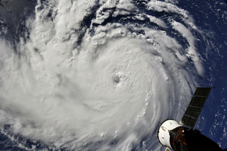 This photo provided by NASA shows Hurricane Florence from the International Space Station on Monday, Sept. 10, 2018, as it threatens the U.S. East Coast. Forecasters said Florence could become an extremely dangerous major hurricane sometime Monday and remain that way for days. (NASA via AP)