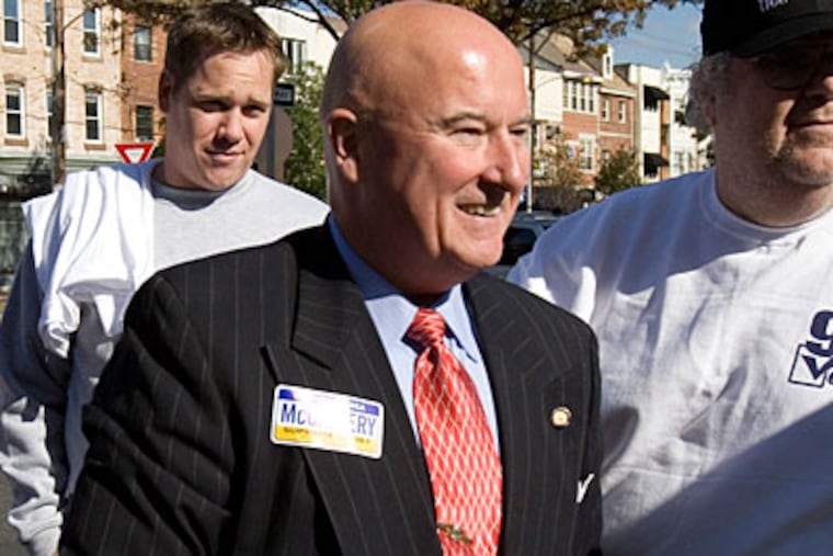 In this 2007 file photo, Seamus McCaffery, then a candidate for Pennsylvania Supreme Court, stands with supporters in Philadelphia. (ED HILLE / Inquirer Staff Photographer)