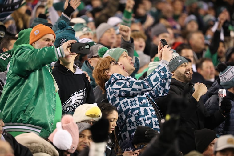 Eagles fans cheer during last week's divisional playoff game against the Giants at Lincoln Financial Field.