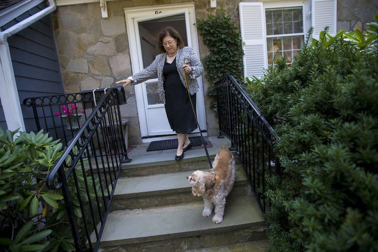 Katie Herzog takes a walk with her dog, Pippen.