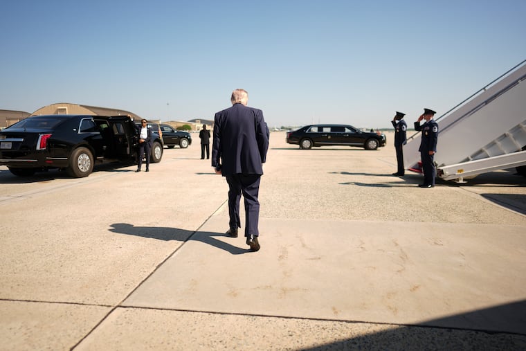 President Donald Trump walks to board Air Force One after speaking to reporters Wednesday at Joint Base Andrews in Maryland.