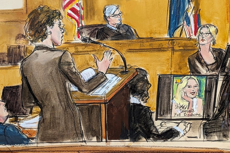 In this courtroom sketch, defense attorney Susan Necheles, center, cross examines Stormy Daniels, far right, whose real name is Stephanie Clifford, as former President Donald Trump, left, looks on with Judge Juan Merchan presiding during Trump's trial in Manhattan criminal court on Tuesday in New York.