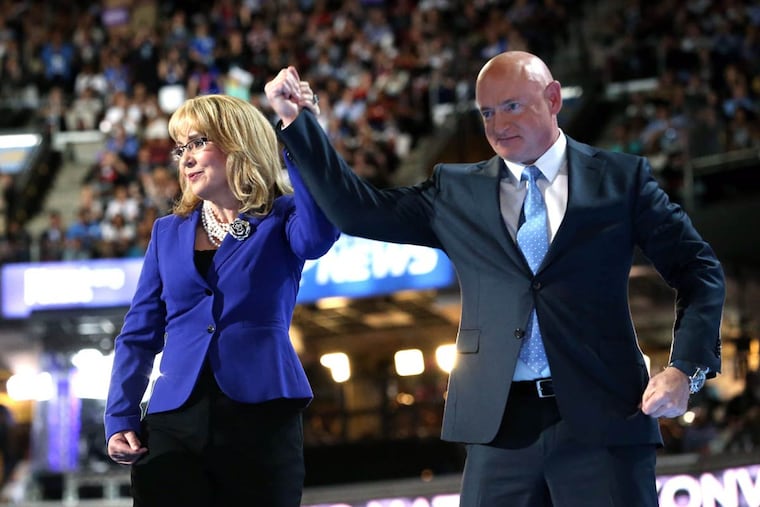 Former Arizona Rep. Gabrielle Giffords spoke for tighter gun laws and said she hoped to be able to call Hillary Clinton “Madam President.”