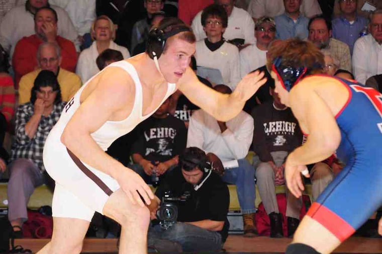 Joe Kennedy (left), a 197-pound Lehigh junior, will be oneof the eight Mountain Hawks wrestling in the nationals.