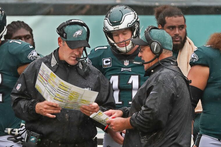 Carson Wentz and the Eagles visit Tennessee, which is on a major roll at home.