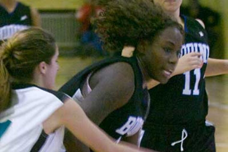 Bodine's Chikilra Goodman drives to the hoop in a game against Palumbo. (Ron Tarver / Staff Photographer)