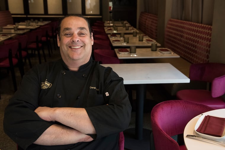 Derek Davis poses for a portrait inside Libertine Restaurant, located at 13th and Spruce Streets.