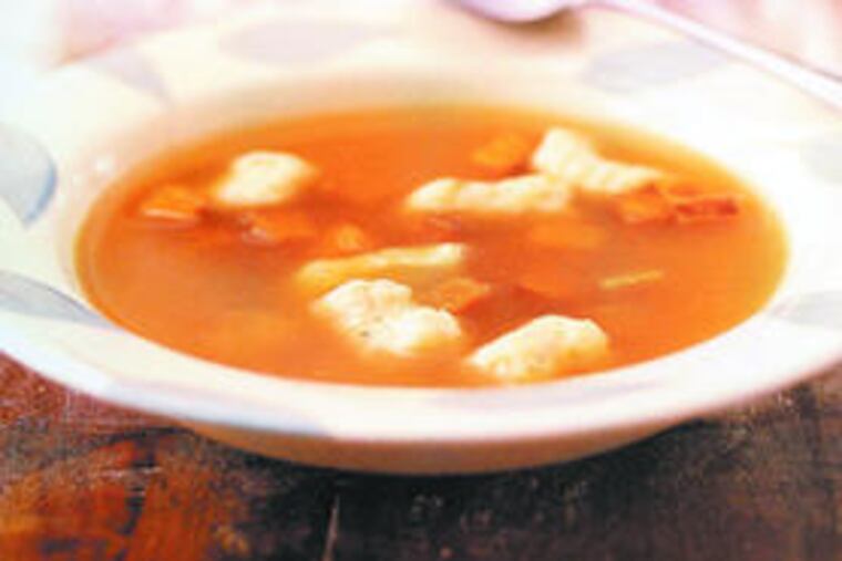 It all starts with a carcass: Roast turkey broth with caramelized butternut squash, sage dumplings.