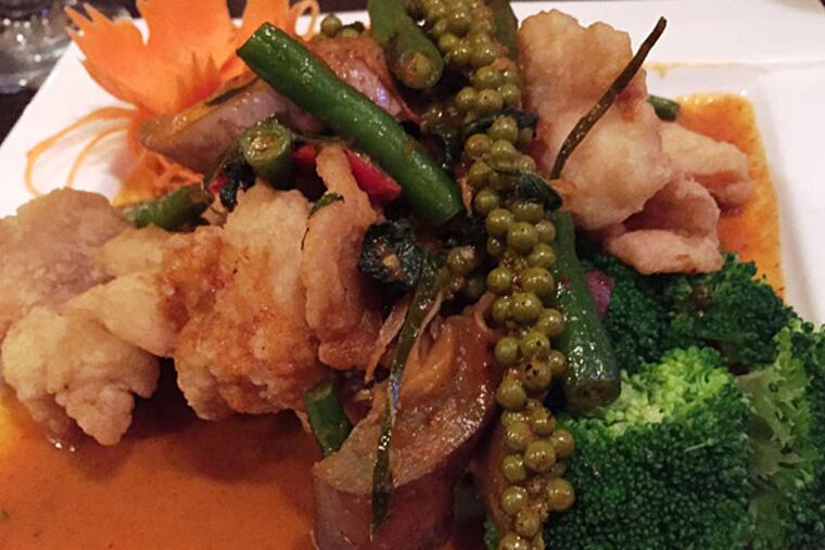 Crispy spicy Thai catfish with peppercorn branches at Thai Square. (Craig LaBan/Staff)