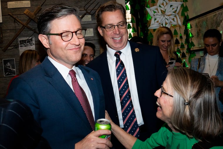 Speaker Mike Johnson (R., La.) did not comment on the anti-Muslim post Monday by Tennessee Rep. Andrew Ogles (right).