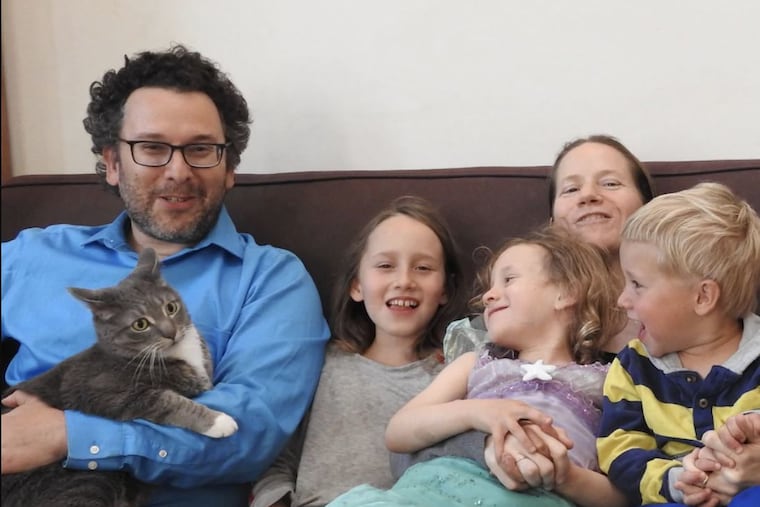 The Levitis family (from left): Dan, Tigerlily, Kestrel, Iris and Peregrine, plus Umberto the cat.