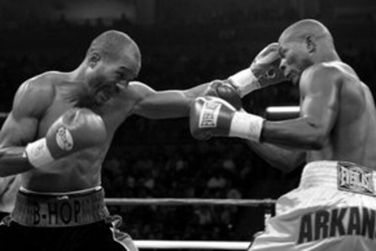 Bernard Hopkins landed this left, but Jermain Taylor won a unanimous decision in their second fight in 2005.