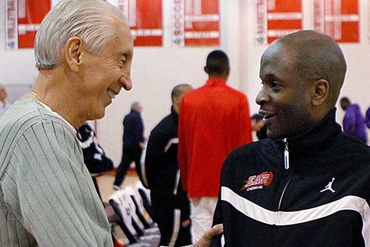 Camden Coach John Valore (left), who had been the coach for CH East
for 35 years, talks with Cherry Hill East coach Dave Allen (right)
before the game. Cherry Hill 58, Camden 51, boys' basketball. December
27, 2013. (Michael S. Wirtz/Staff Photographer)