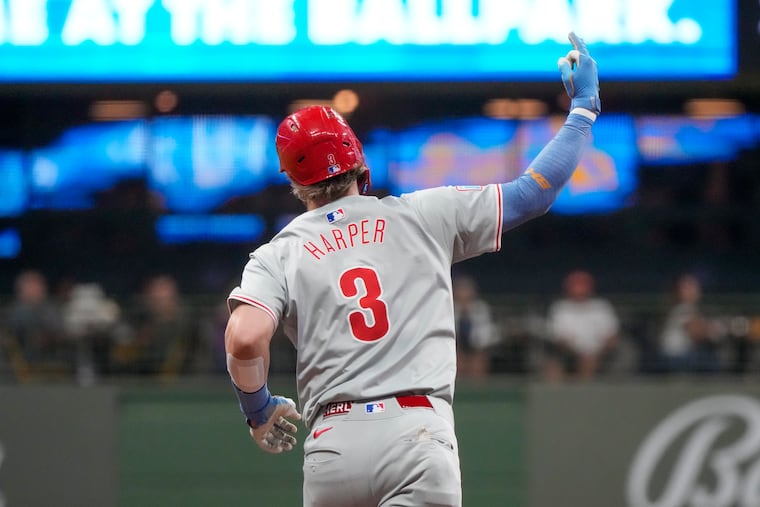 Bryce Harper reacts after hitting a two-run homer in the sixth inning, his third since Saturday.