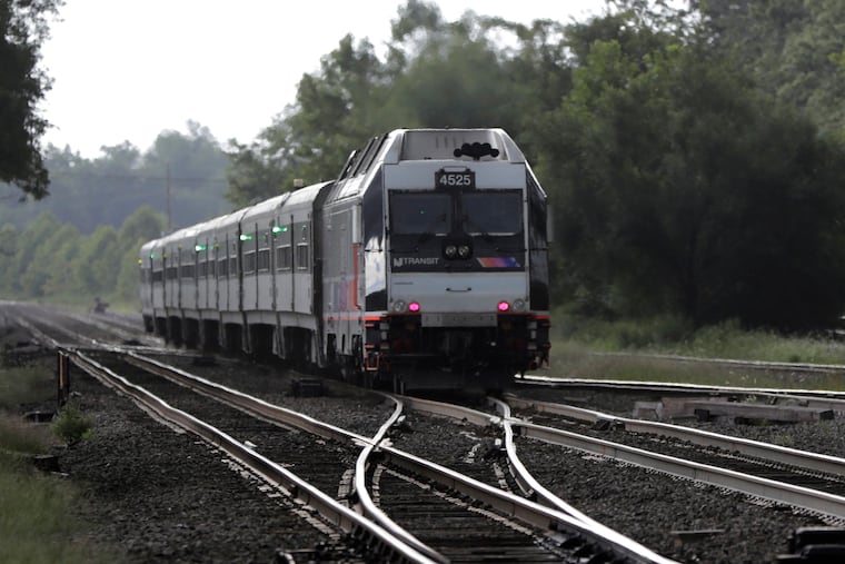 In this August 3028 file photo, an NJ Transit train leaves the station in Bound Brook, N.J.