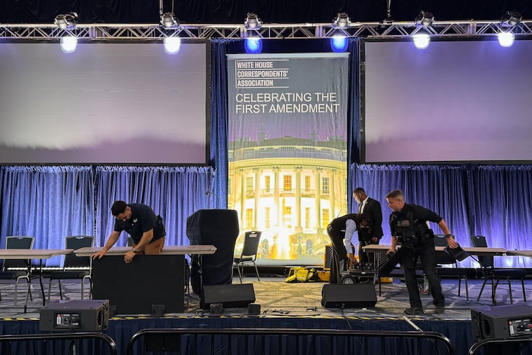 Staff clean up after a shooting incident at the White House Correspondents Dinner, Saturday, April 25, 2026, in Washington.
