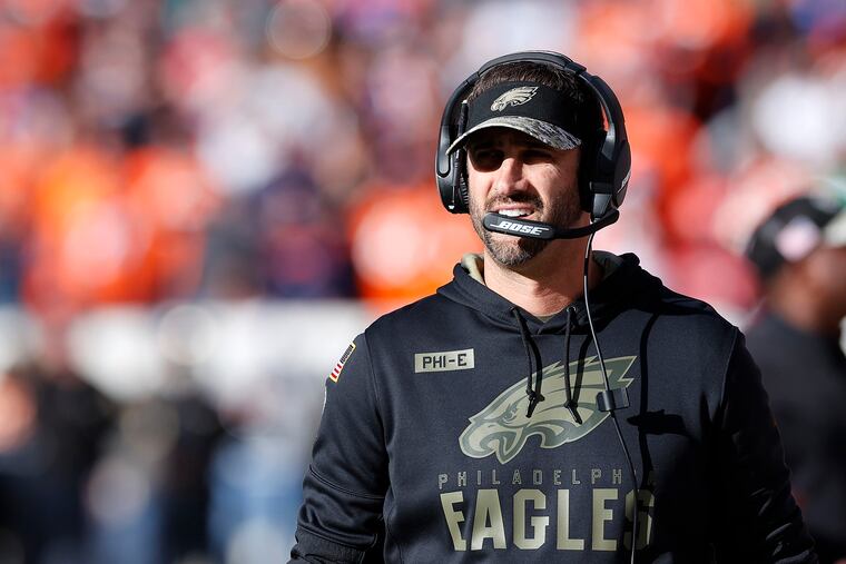 Eagles coach Nick Sirianni walks along the sideline before the victory over the Broncos.