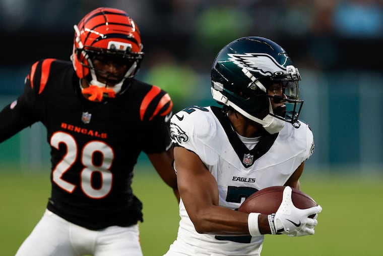 Wide receiver Jahan Dotson catches a pass with Cincinnati Bengals cornerback Josh Newton in coverage during the Eagles' preseason opener on Aug. 7.