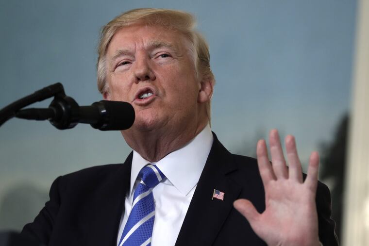 President Donald Trump delivers a statement in the Diplomatic Reception Room of the White House, Wednesday, Nov. 15, 2017, in Washington.