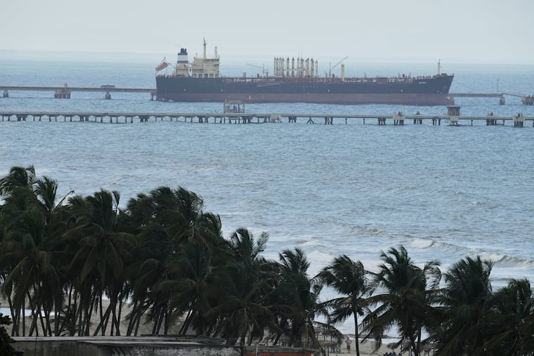 Evana, an oil tanker, is docked at El Palito port in Puerto Cabello, Venezuela, Sunday, Dec. 21, 2025. (AP Photo/Matias Delacroix)