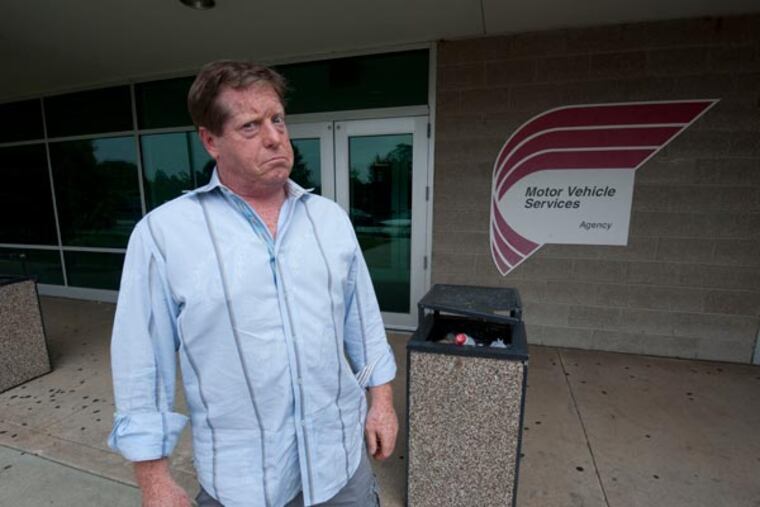 In Cherry Hill, visitors to the DMV found that computers were down on Sept. 12, 2013. Here, Murray Bernstein of Voorhees, who was hoping to transfer title and get registration and tags for a car he just bought. ( APRIL SAUL / Staff )
