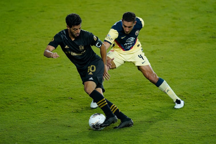 Carlos Vela, left, leads Los Angeles FC against Mexico's Tigres UANL in the Concacaf Champions League final on Tuesday.