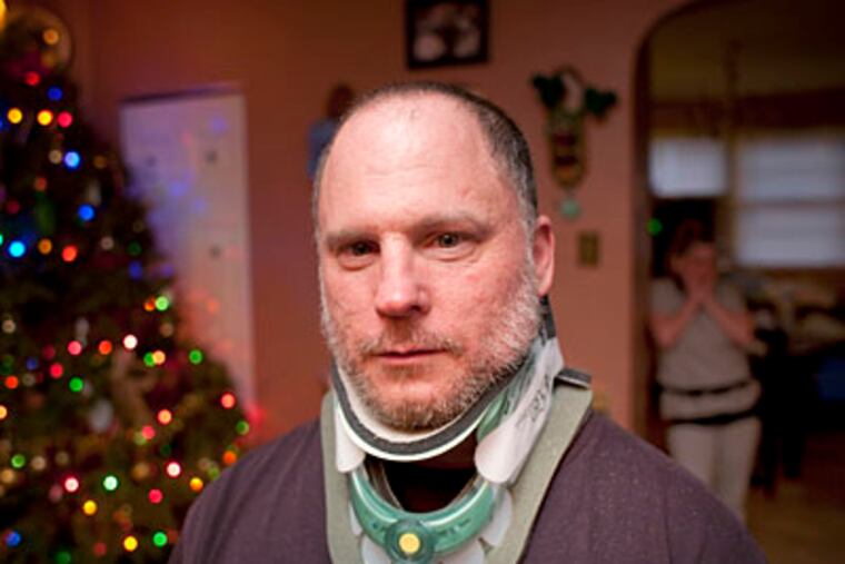 Security guard Howard Rubin was shot in the neck at a Sunoco A-Plus mini mart in West Philadelphia on Dec. 15. (ED HILLE / Staff Photographer)