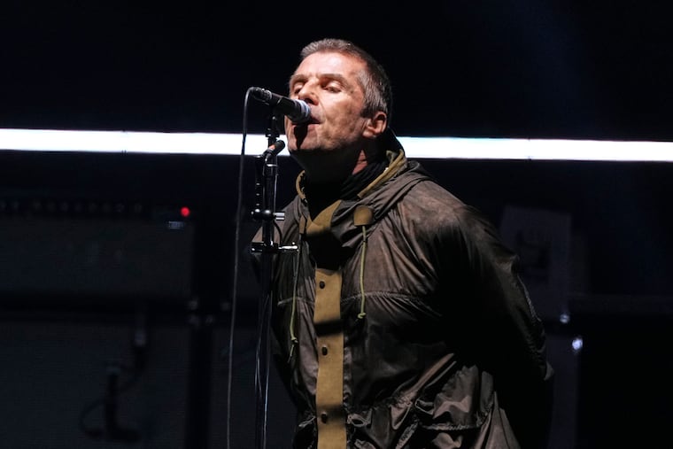 Liam Gallagher from the band Oasis performs during their reunion concert on Friday, July 4, 2025, in Cardiff. (Photo by Scott A Garfitt/Invision/AP)