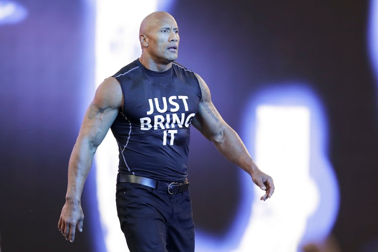 Dwayne "The Rock" Johnson makes his entrance at Wrestlemania XXXI, Sunday, March 29, 2015, in Santa Clara, Calif. Dwayne “The Rock” Johnson is back to perform in one of the main events this weekend's WrestleMania 40 in Philadelphia.
