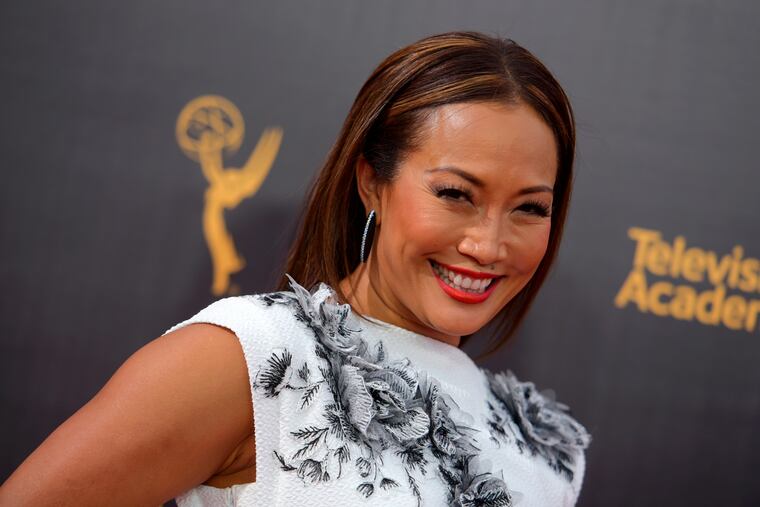 FILE - In this Sept. 11, 2016, file photo, Carrie Ann Inaba arrives at night two of the Creative Arts Emmy Awards at the Microsoft Theater in Los Angeles. Inaba is no longer a temp on “The Talk.” The CBS daytime show announced Wednesday, Jan. 2, 2019, that Inaba has joined the panel of hosts, moving up from recurring guest host. (Photo by Richard Shotwell/Invision/AP, File)