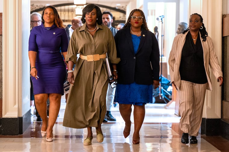 Mayor Cherelle L. Parker walks from her office at City Hall on Wednesday, Jul. 9, 2025, to speak hours after her administration struck a tentative contract agreement with District Council 33 leaders overnight, ending the workers strike. With her are: Chief Deputy Mayor Sinceré Harris (from left); Chief of staff Tiffany W. Thurman; and Chief Deputy Mayor Vanessa Garrett-Harley.