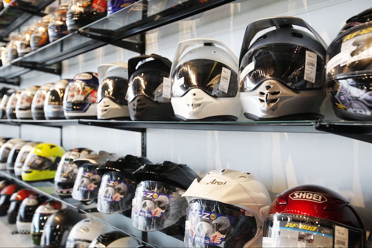 Customers can try on gear like these helmets in a unique 4,500 square-foot retail store. RevZilla is the largest online retailer of motercycle gear, located in the Philadelphia Naval Business Center.