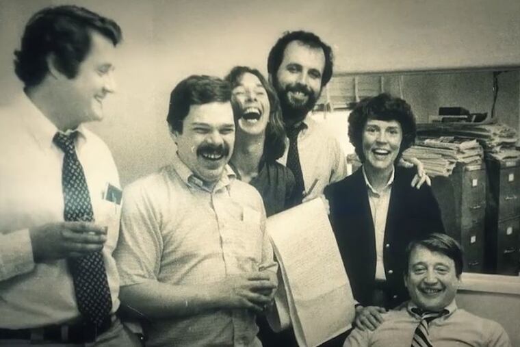 Larry Williams, second from left, celebrates The Inquirer's 1980 Pulitzer for its coverage of Three Mile Island. Others in the photo, from left: Maxwell E. P. King, Mary Walton, Steve Lovelady, Susan Q. Stranahan, and David R. Boldt.