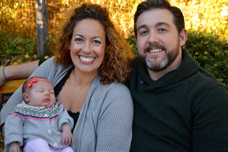 Jenny and Burton Mills with daughter Talula Josephine.