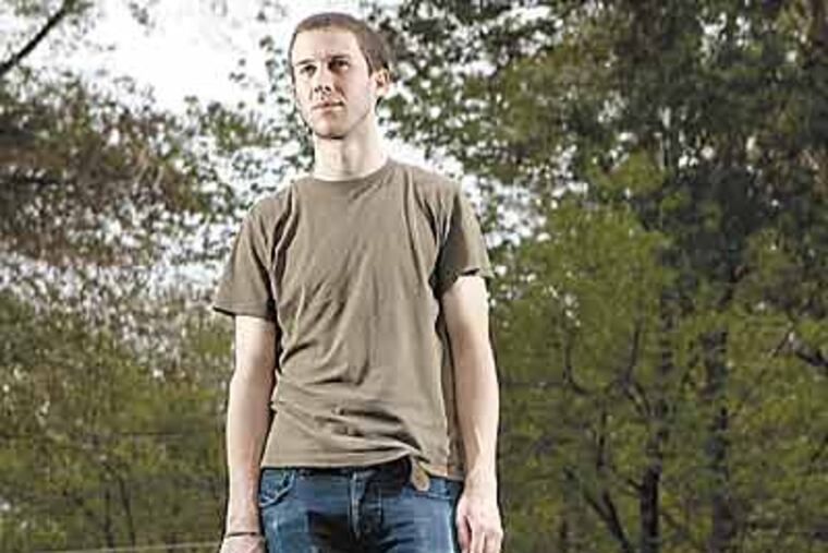 Kevin McKenzie of Cherry Hill plays in a band and had no insurance when he needed to go to a hospital for a racing heart. (Michael Perez / Staff Photographer)