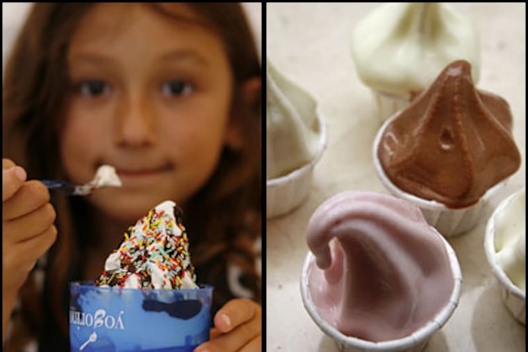 Gabriela Petrone spoons up her treat, topped with sprinkles, chocolate, and M&Ms.