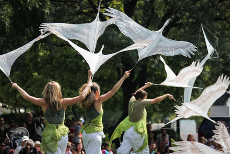 "Celebration of Flight,"an environmental spectacle by , unifies dance, kite, and puppet movement with themes of seasonal movement and Earth's energy flow. Saturday at Scott Amphitheater. (Heather Henson's Ibex Puppetry)