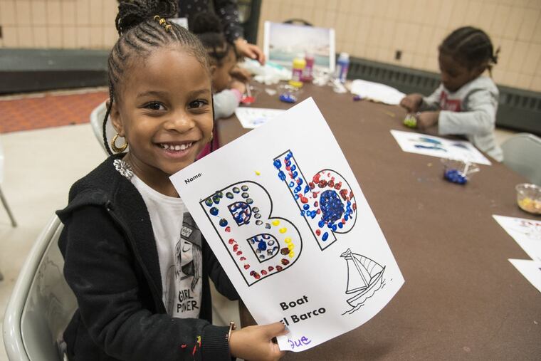 Suhaylah Gilliland, 4, shows off her artwork in her pre-K class. The Philadelphia Beverage Tax (PBT), a levy on the distribution of artificially and sugar-sweetened beverages, brings in funds that will go toward expanding quality pre-K.