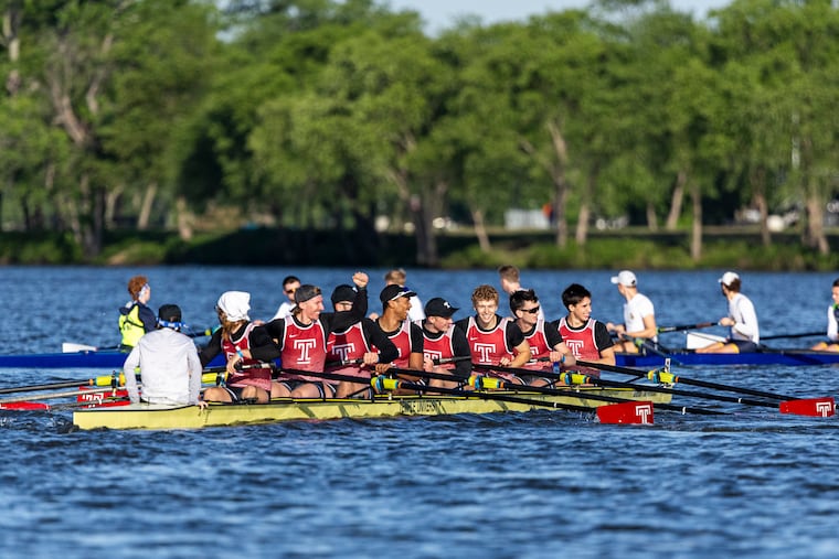 Temple men's varsity eight look out toward their family, friends, and supporters after winning first place in the grand finals at the Dad Vail Regatta on May 10.