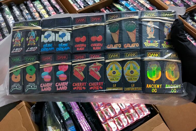 In this Monday, Sept. 23, 2019 photo released by Northwest Metro Drug Task Force/Minnesota Departments of Public Safety shows “Dank” packaging, part of the 75,000 THC vaping cartridges seized in a record drug bust in Anoka County, Minn.